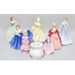 Seven Royal Doulton Porcelain Figures of Ladies; together with a porcelain posy bowl (one tray)