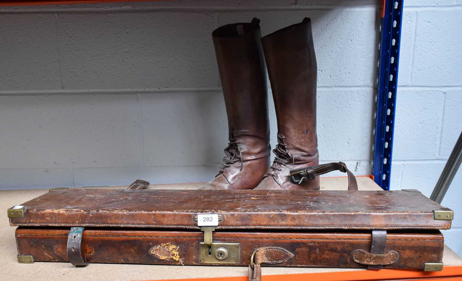 A Leather Shotgun Case, the topped stamped JE Harrison, Harrogate, together with a pair of early