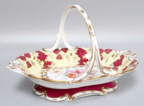 A 19th Century English Floral Painted Porcelain Basket, possibly Coalport, 25cm wide