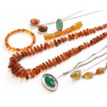 A Small Quantity of Amber Jewellery, comprising of three bracelets, a necklace and a pendant on