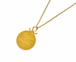 A Pendant on Chain, the circular medallion on a fancy link chain, pendant length 3.7cm, chain length