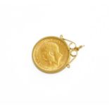 A Sovereign Pendant, dated 1912 in a 9 carat gold loose mount, length 3.4cm Gross weight 9.7 grams.