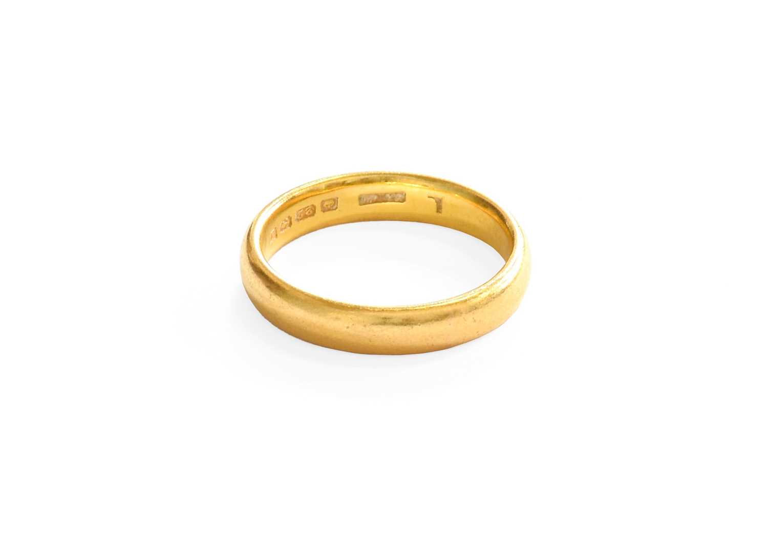 A 22 Carat Gold Band Ring, finger size Q Gross weight 6.8 grams.