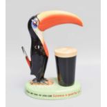 A Carltonware Advertising Guinness Tablelamp, surmounted by a toucan £80-120 Wear around lamp