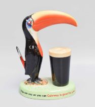 A Carltonware Advertising Guinness Tablelamp, surmounted by a toucan £80-120 Wear around lamp