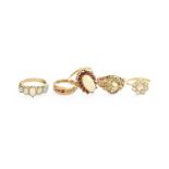 Five Dress Rings, comprising of a 9 carat gold opal and garnet cluster ring, finger size Q; a 9