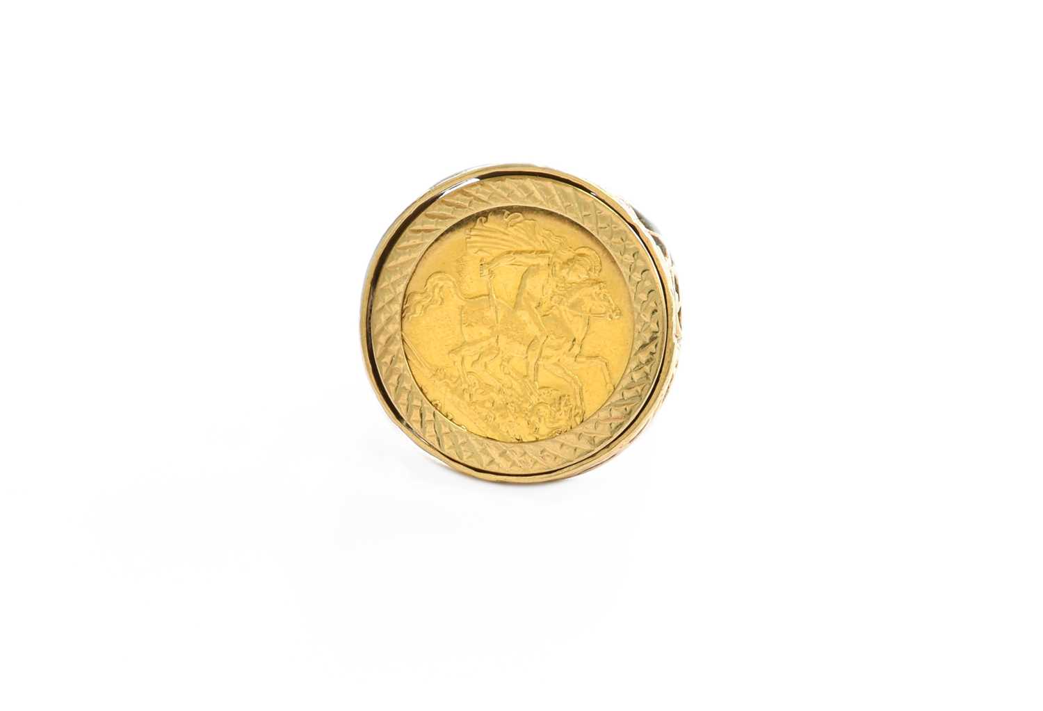 A Half Sovereign Ring, dated 1913 in a 9 carat gold loose mount, finger size M Gross weight 8.2