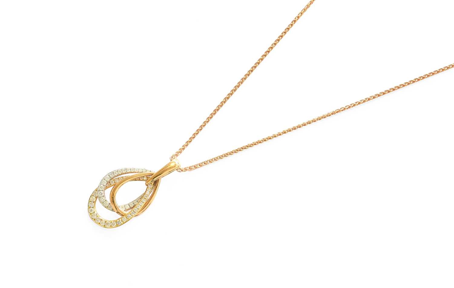 An 18 Carat Tri-Colour Gold Diamond Pendant on Chain, three intertwined openwork pear shaped links