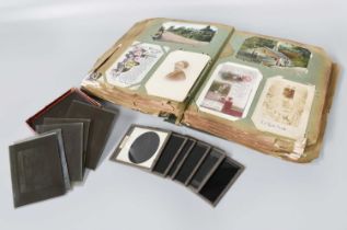 A Late Victorian Album, containing a quantity of photograhic and topograpical postcards, and a group