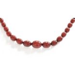 A Bakelite Bead Necklace, comprising of graduated beads, length 69.3cm Gross weight 90.8 grams.