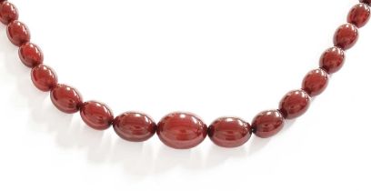 A Bakelite Bead Necklace, comprising of graduated beads, length 69.3cm Gross weight 90.8 grams.