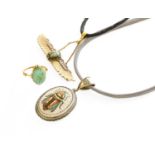A Winged Scarab and Diamond Brooch/Pendant, on a corded necklace, measures 6.2cm by 5.1cm; A