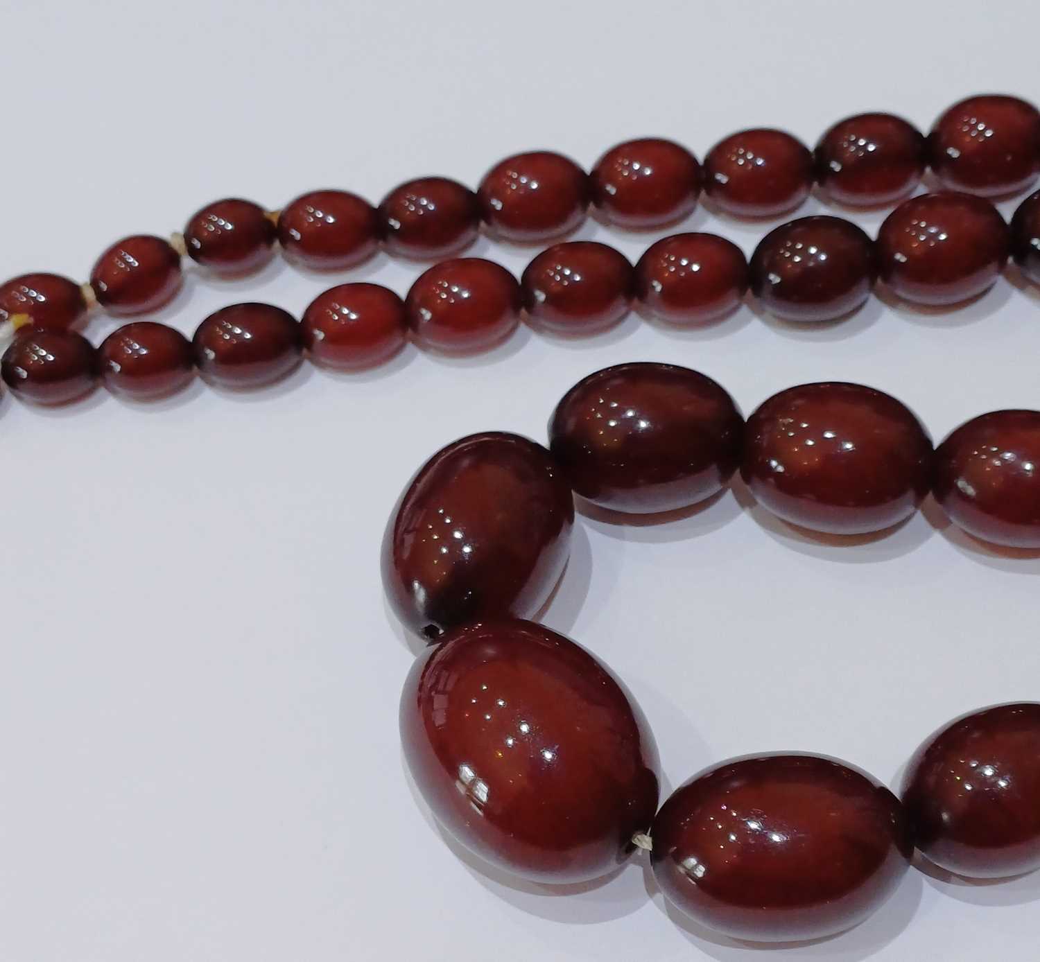 A Bakelite Bead Necklace, comprising of graduated beads, length 69.3cm Gross weight 90.8 grams. - Image 9 of 9