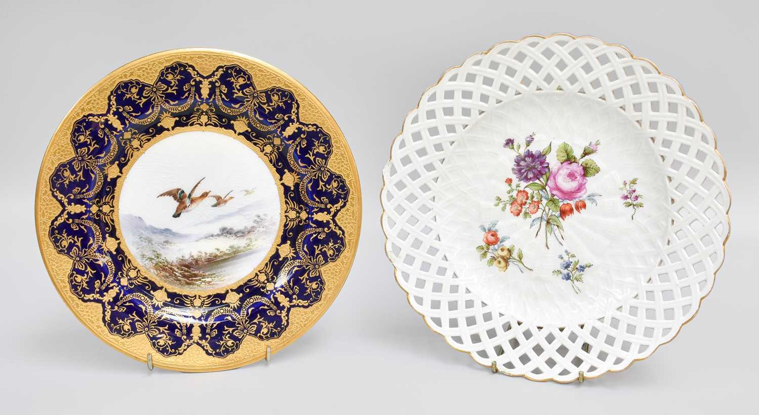 A 19th century Meissan Floral Painted Plate, on a basket weaved ground, with pierced rim; together