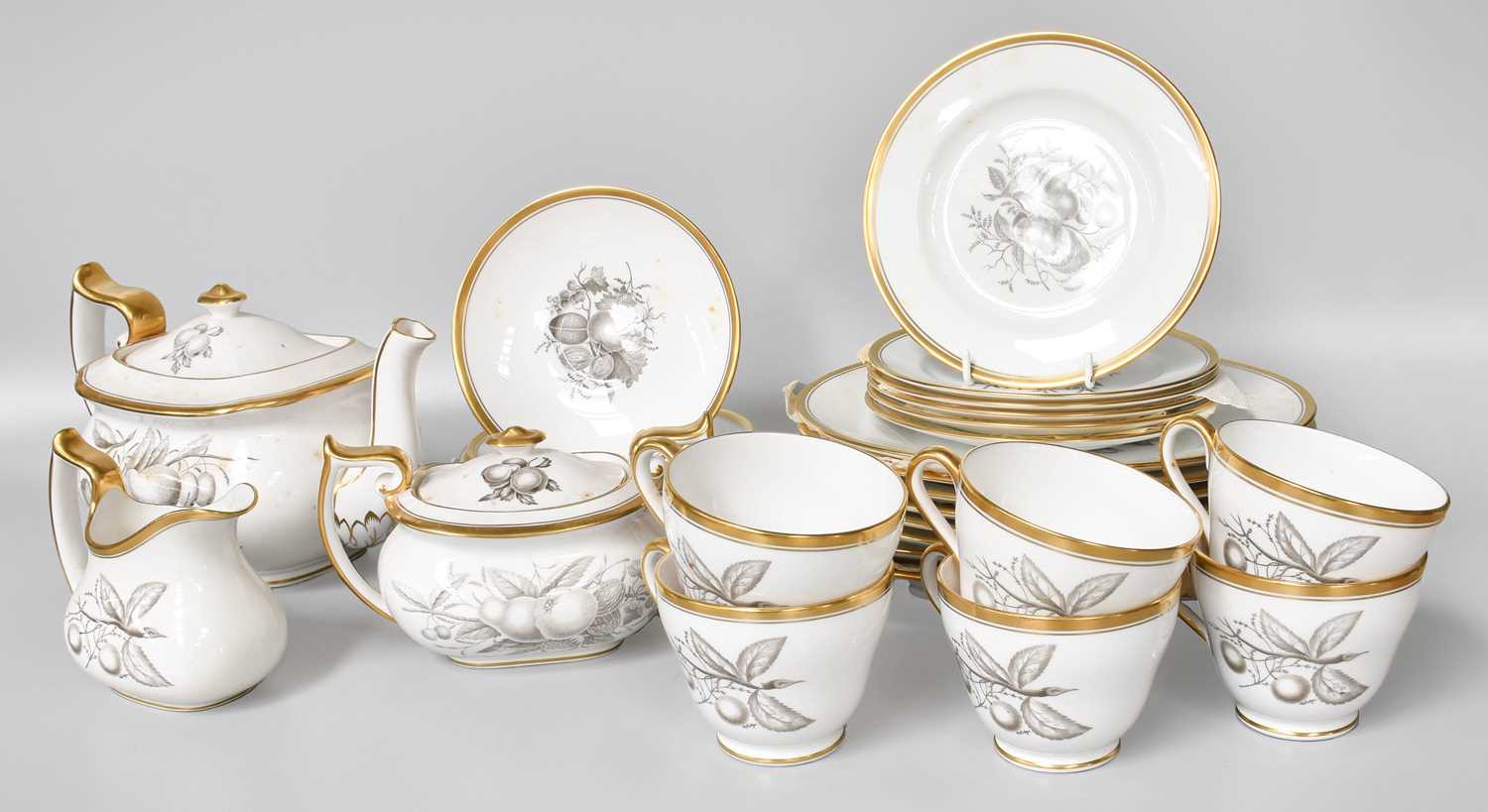 A Spode Chathan Pattern Tea Service, decorated with monochrome fruit and gilt borders (one tray)