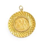 A Sovereign Pendant, dated 1904, in a 9 carat gold loose mount, length 4.8cm Gross weight 13.7