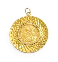 A Sovereign Pendant, dated 1904, in a 9 carat gold loose mount, length 4.8cm Gross weight 13.7