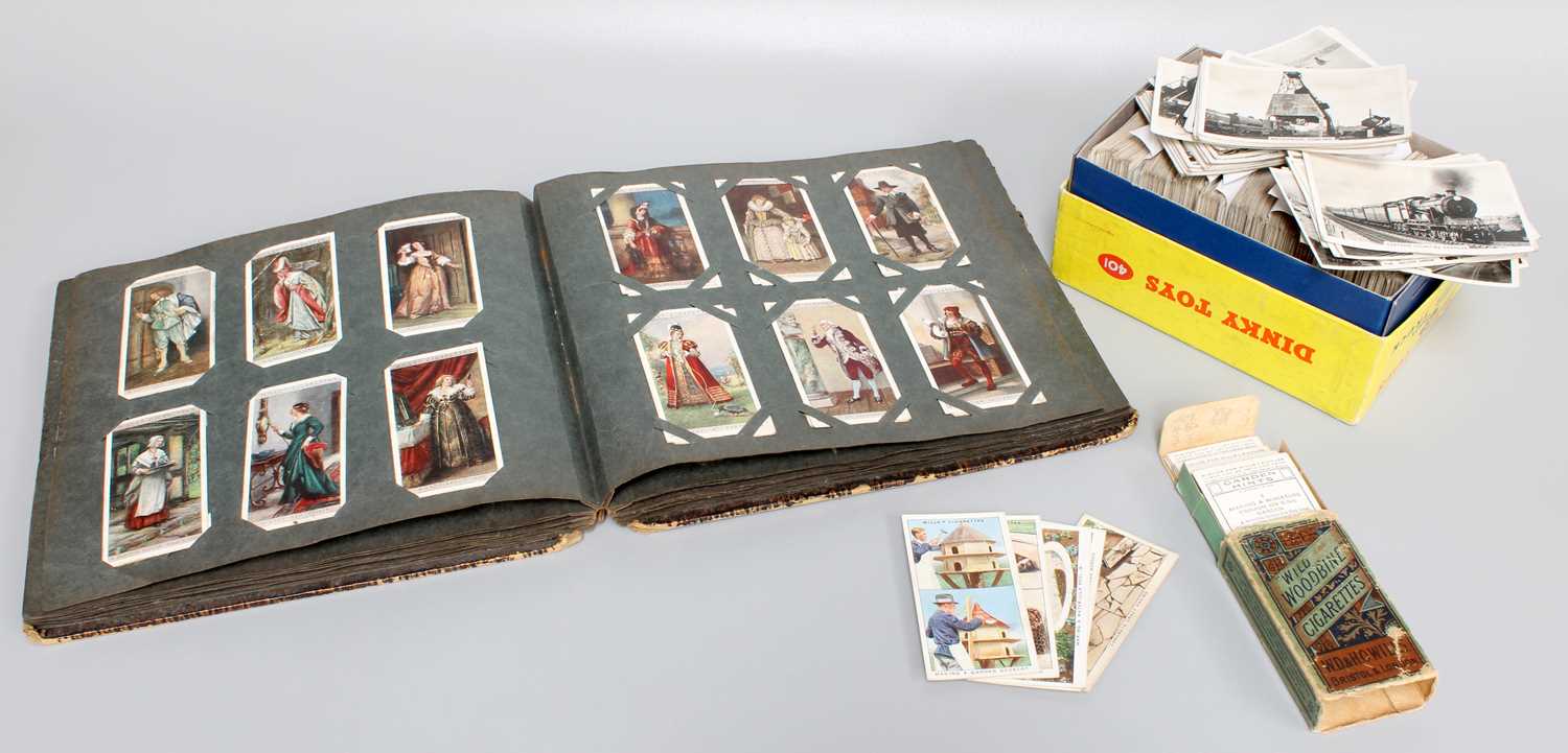 A Selection of Cigarette Cards. contained in a Dinky Toys Fork Lift Truck box, and a Cigarette