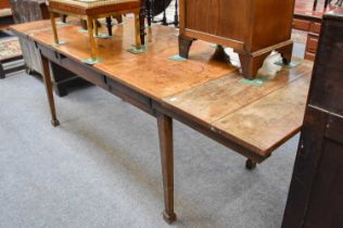 A Late 19th century French Oak Farm House Table, with later detatchable leaves, 240cm by 80cm by