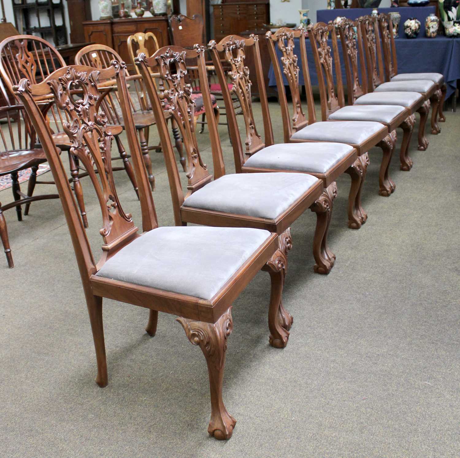 A Set of Eight Chippendale Revival Mahogany Dining Chairs, serpentine back rails over elaborate