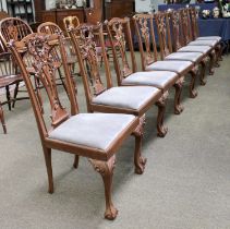 A Set of Eight Chippendale Revival Mahogany Dining Chairs, serpentine back rails over elaborate