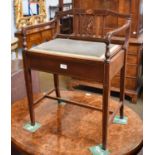 An Edwardian Mahogany and Inlaid Piano Stool, with slat back, scroll arms, hinged seat, raised on