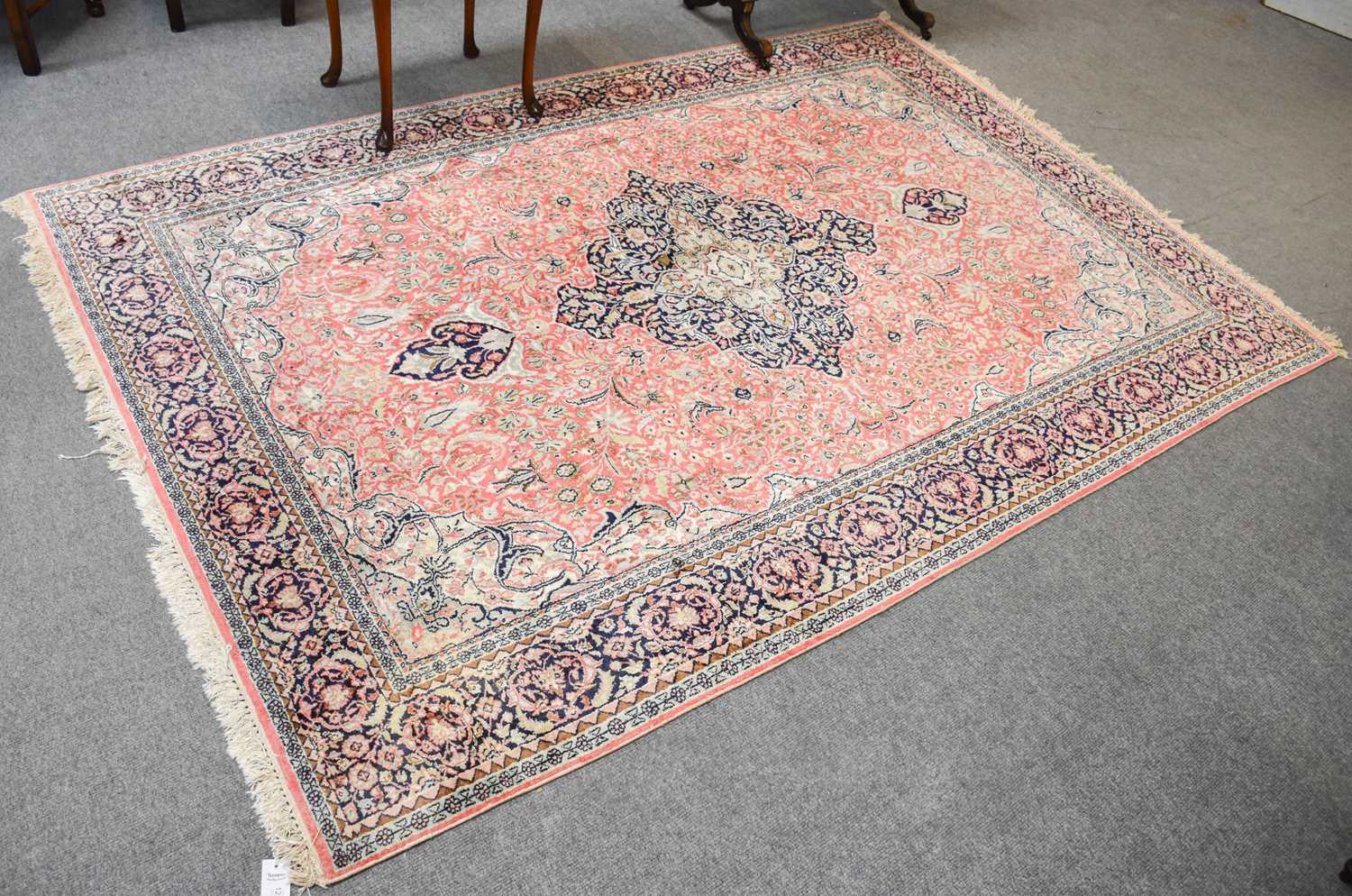 A Kashmir Silk Piled Carpet, the coral pink field of vines centred by an indigo medallion, framed by - Image 2 of 2