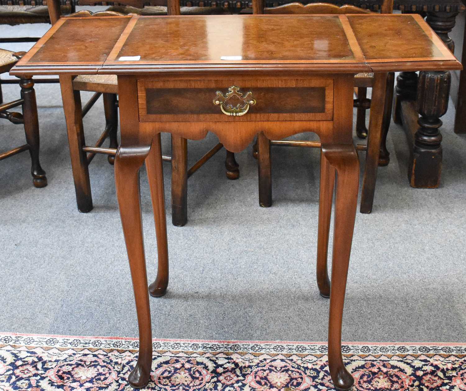 A Queen Anne Style Burr Walnut and Cross Banded Drop Leaf Lamp Table by Waring and Gillow Ltd, - Image 2 of 2