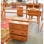 An Ercol Light Elm Bedside Chest of Drawers, 48cm by 45cm by 53cm, together with a two tier plate