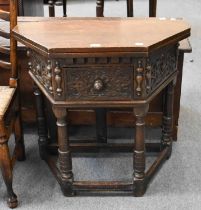 A Victorian Carved Fold Over Table, in 17th century style fitted with a drawer, 82cm by 41cm by 77cm