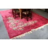 Chinese Carpet of Art Deco Design, the cerise field with semi-naturalistic flowering vines to