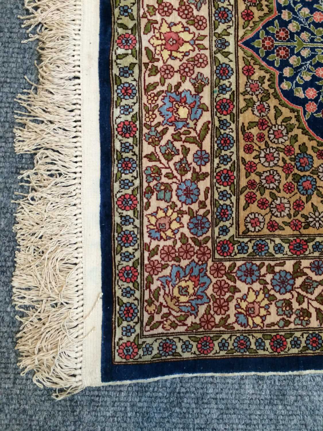 A Hereke Silk Rug, the indigo field of flowering plants, framed by mustard spandrels and ivory - Image 14 of 14