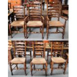 A Set of Six Titchmarsh & Goodwin Style Ladderback Dining Chairs, with rush seats, comprising two