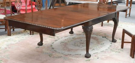 A Victorian Extending Dining Table, with three additional leaves, on ball and claw feet, 305cm by