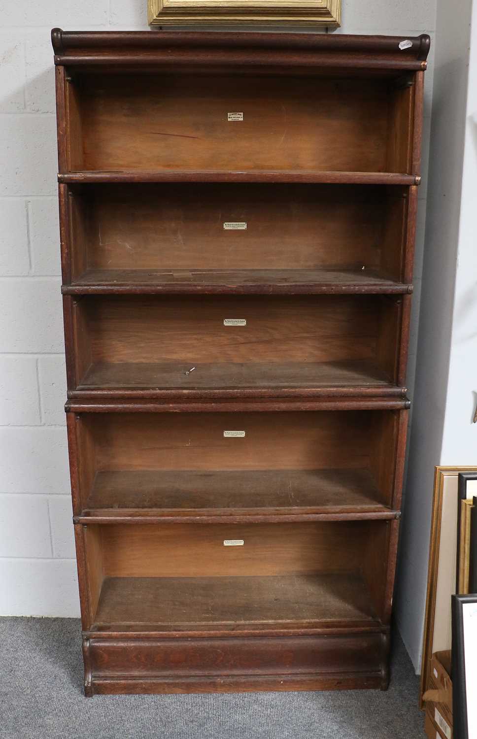 A Five Tier Oak Globe Wernicke Bookcase, 87cm by 31cm by 176cm (no glass doors)