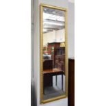 A Gilt Framed Hall Mirror, 136cm by 43cm