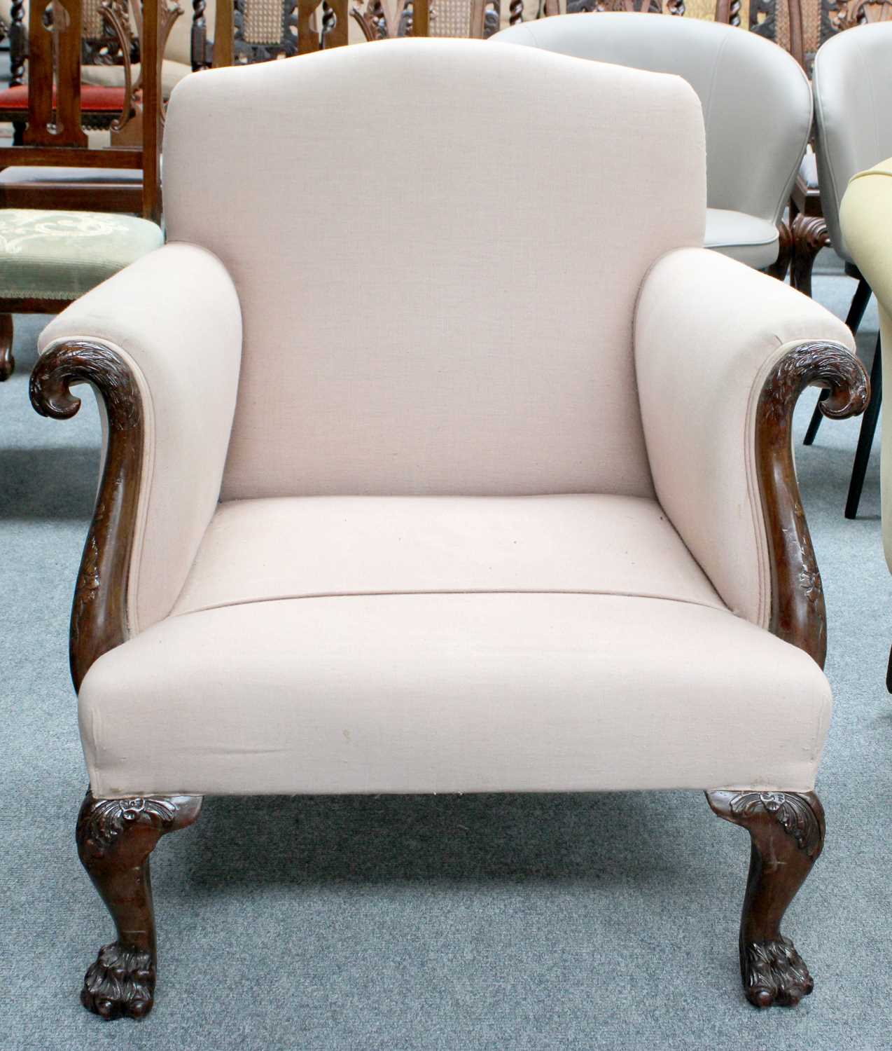 A Mahogany Framed Low Armchair, with eagle carved arms and paw feet