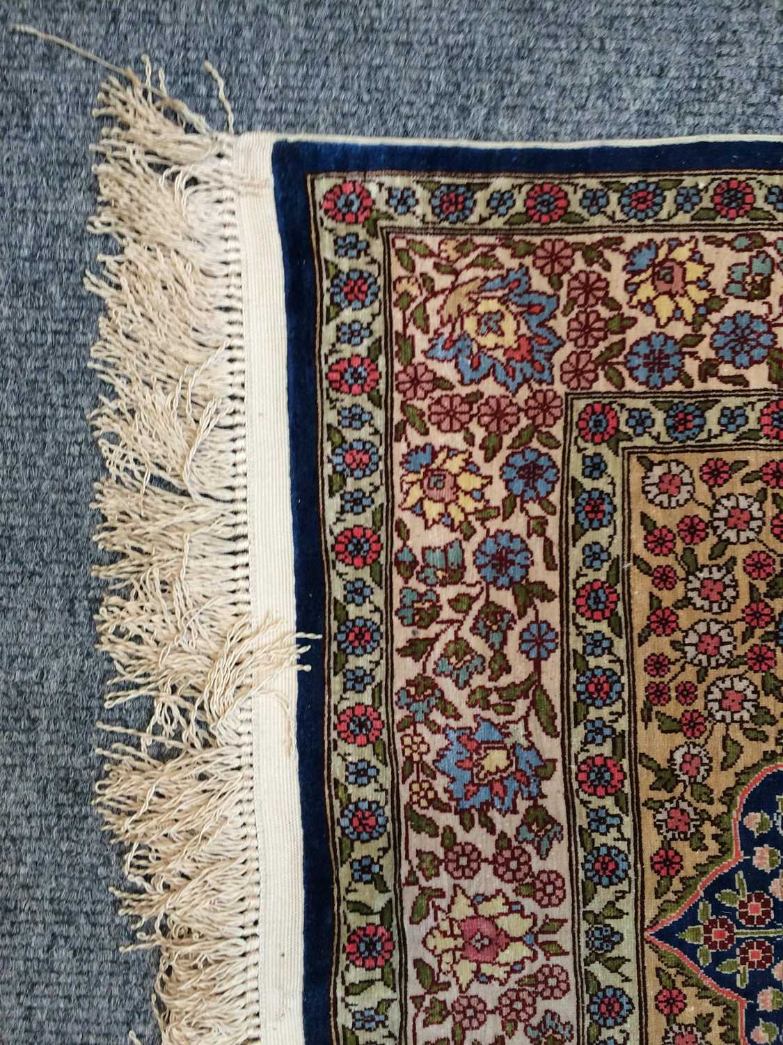 A Hereke Silk Rug, the indigo field of flowering plants, framed by mustard spandrels and ivory - Image 9 of 14