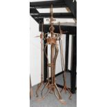 A 15th Century Style Wrought Iron Stand, 181cm, together with a pair of further iron stands