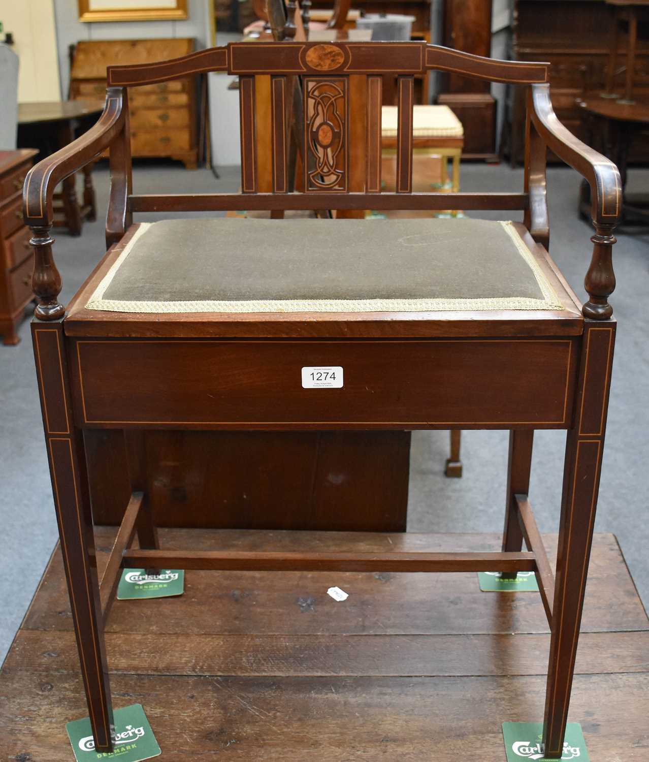 An Edwardian Mahogany and Inlaid Piano Stool, with slat back, scroll arms, hinged seat, raised on - Image 2 of 2