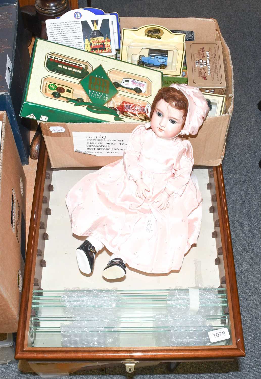 A Marseille 390 Bisque Head Doll, in a pink dress, together with a Collection of Toy Cars in