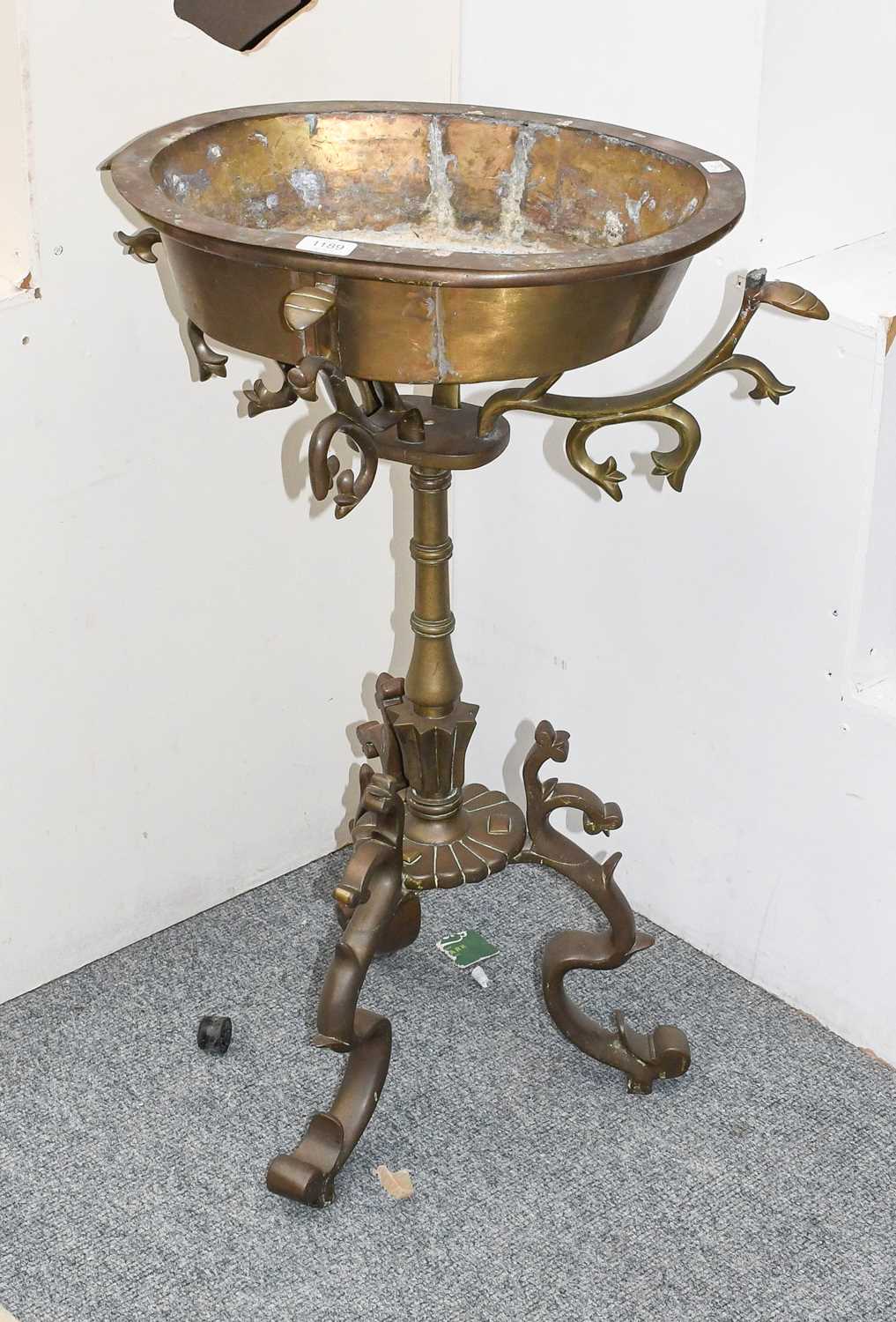 An Indian Brass Planter, 82cm high