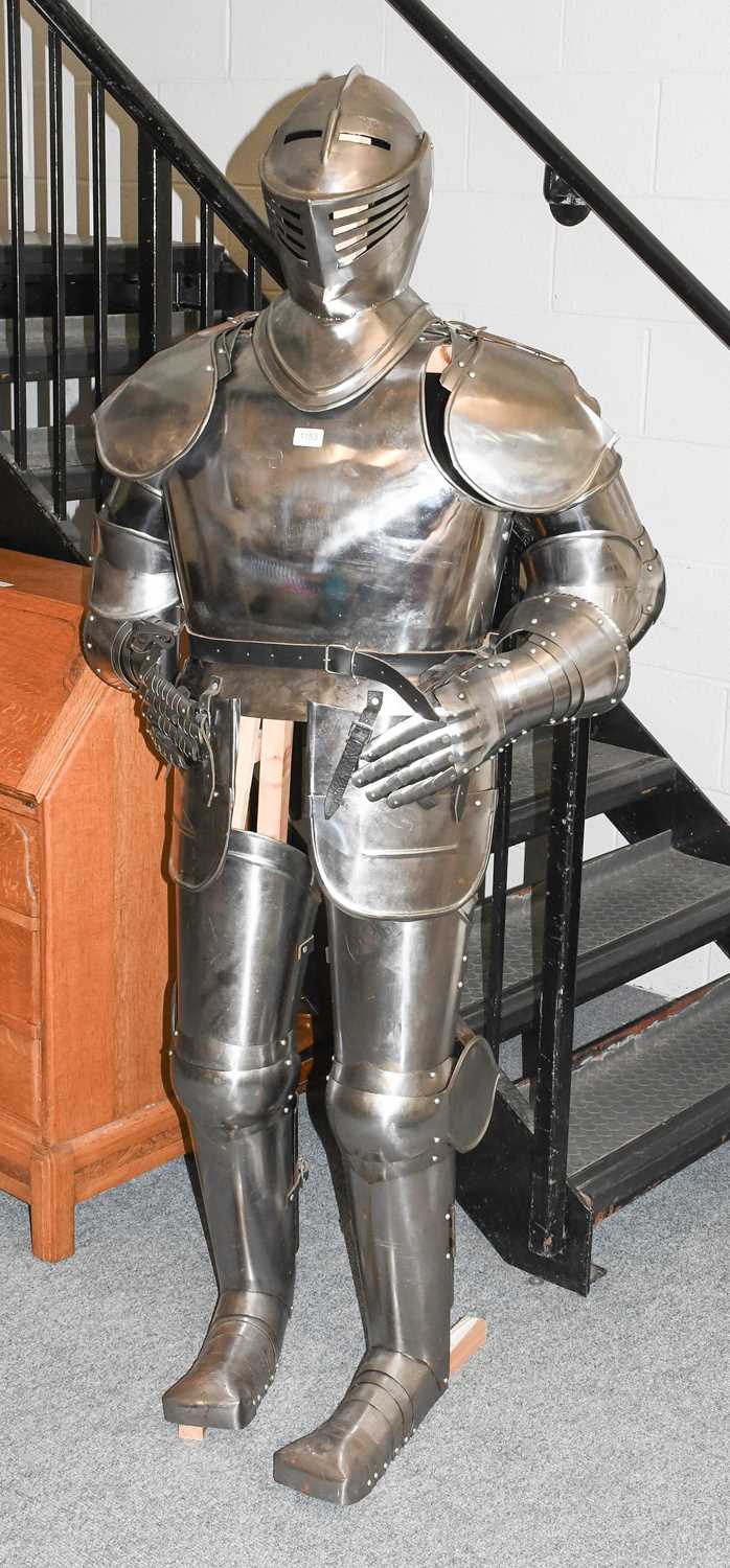 A Modern Reproduction Polished Steel Complete Suit of Armour, on wooden stand 173cm high on its - Image 4 of 4