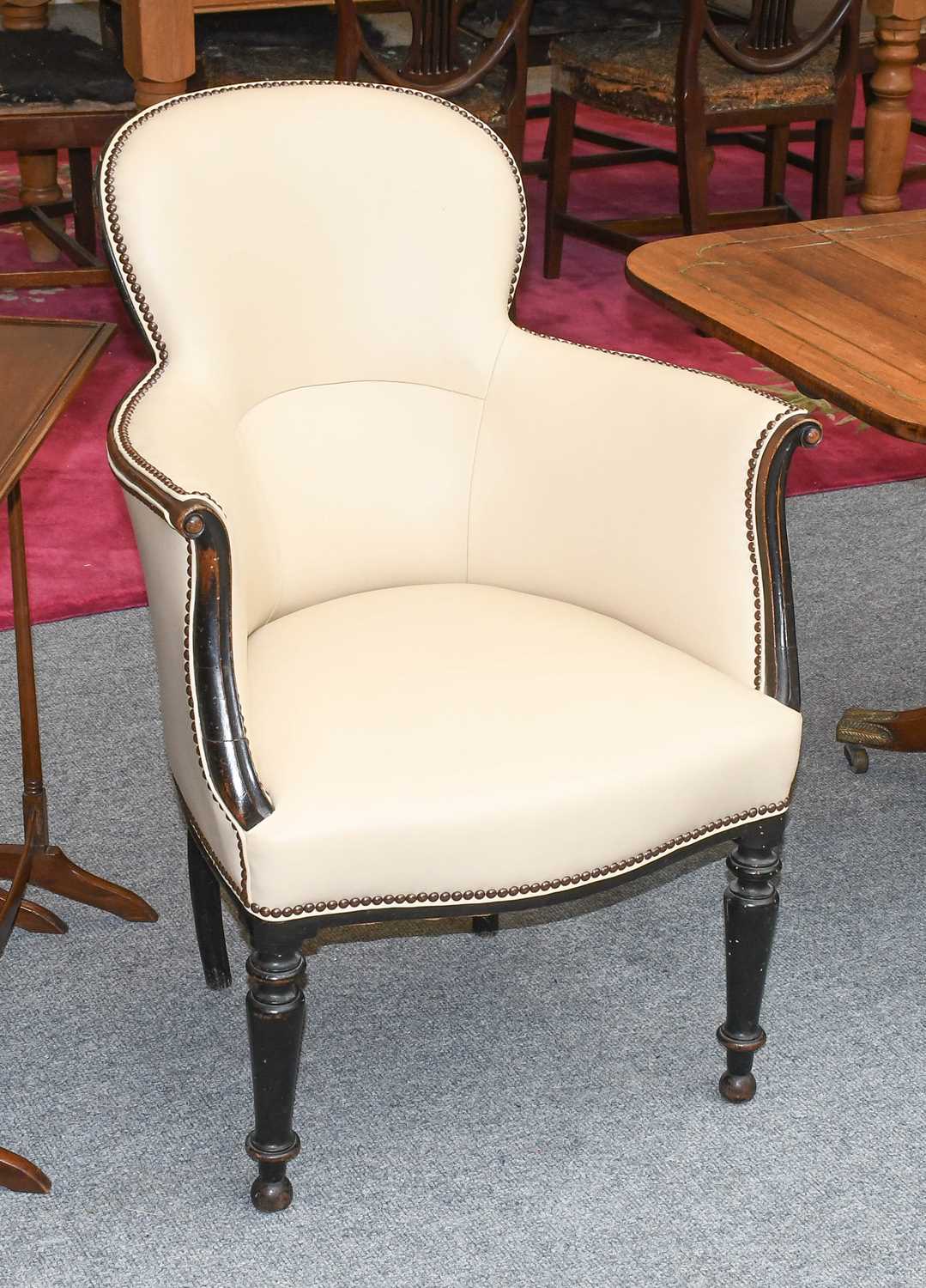A 19th Century Mahogany Framed Armchair, with cream studded leather upholstery