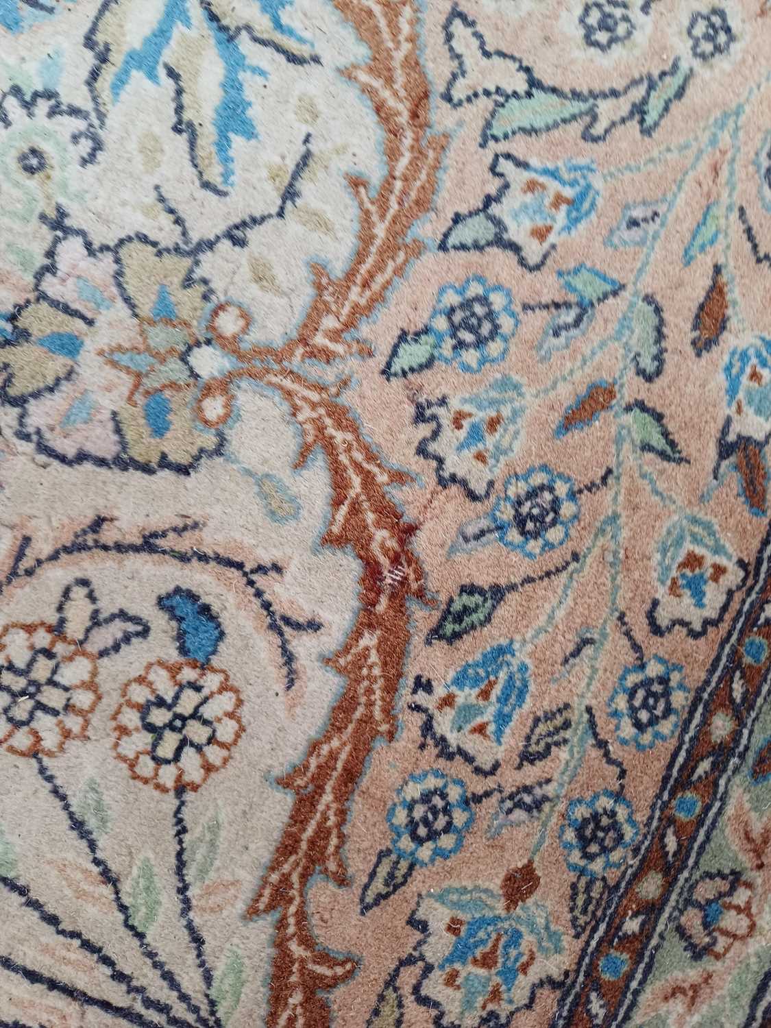 Kashan Design Carpet, the cream field of vines centred by a medallion, framed by spandrels and - Image 7 of 10