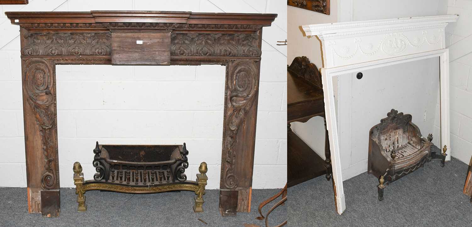 A Neo Classical Gilt Brass and Cast Iron Fire Grate, 96cm wide; together with a carved oak break