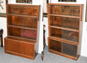 A Near Pair of Oak Four Tier Sectional Bookcases, by Minty, Oxford, 90cm by 40cm by 140cm
