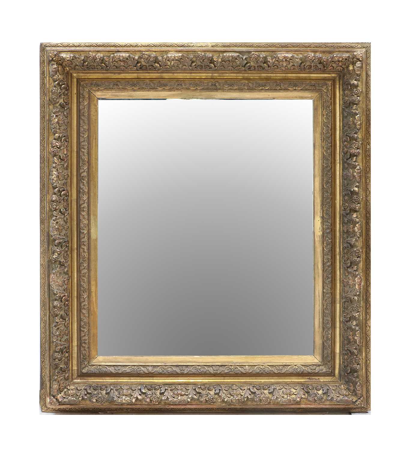 A Victorian Carved Giltwood and Gesso Picture Frame, mid 19th century, with later plain mirror plate