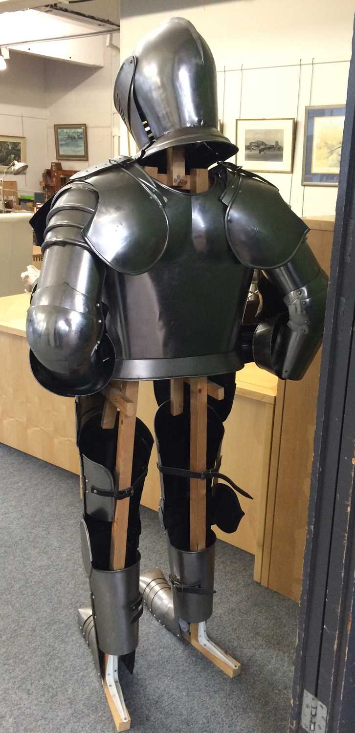 A Modern Reproduction Polished Steel Complete Suit of Armour, on wooden stand 173cm high on its - Image 3 of 4