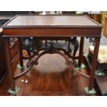 A Reproduction Mahogany Silver Table, with pierced spandrals and shaped stretchers, 81cm by 53cm